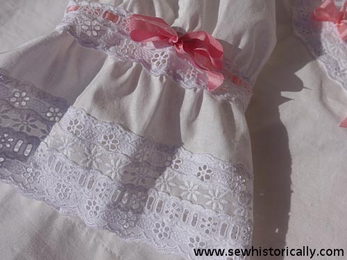 Edwardian eyelet lace sleeves with silk ribbons