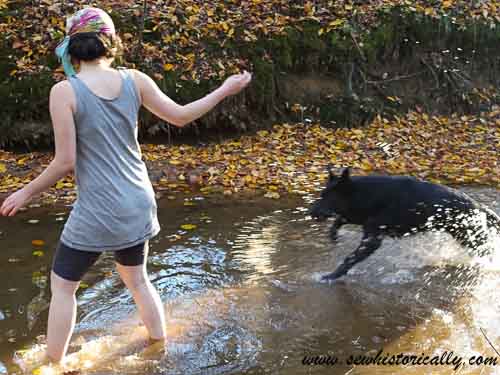 1920s bathing suit dog splashing water